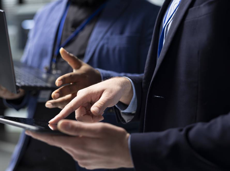 multiethnic technicians building contractors group analyzing data