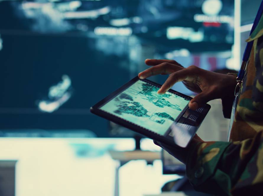 an army soldier analysing the military and defense data storage reports